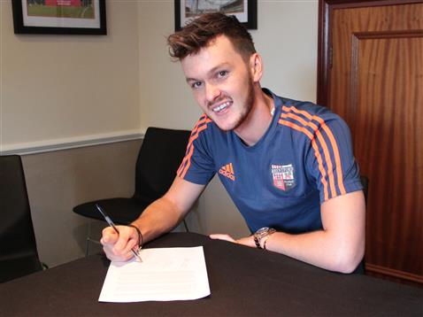 Josh signs for Brentford - no beard but a fine moustache